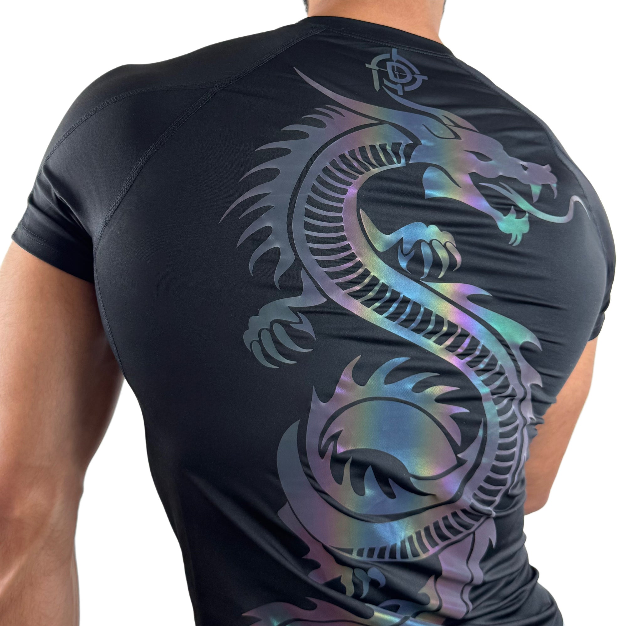 Close-up of a black men’s compression shirt featuring a large iridescent dragon design on the back, modeled on a white background