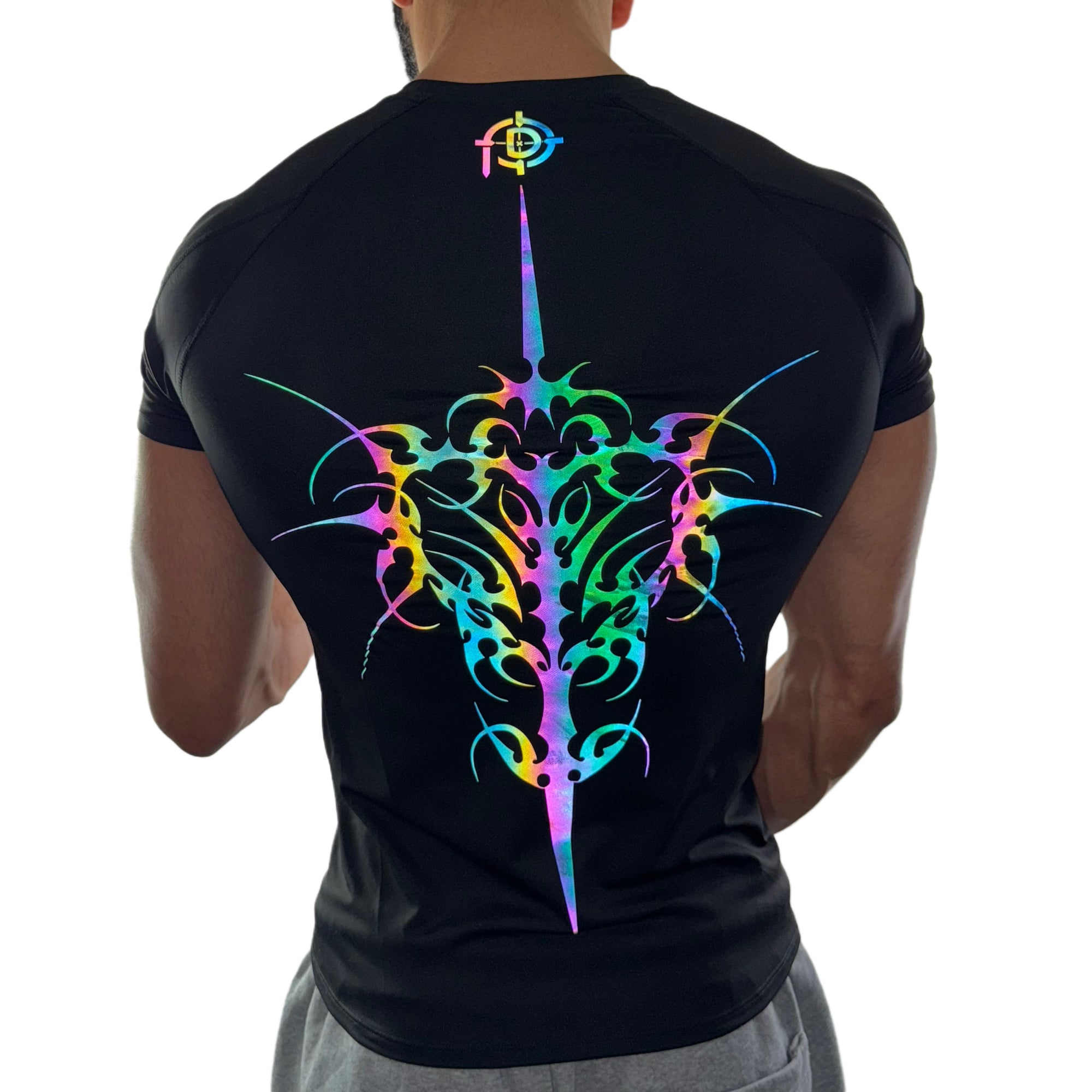 Men’s black compression tee featuring a vibrant rainbow reflective tribal sword and spine design on the back.